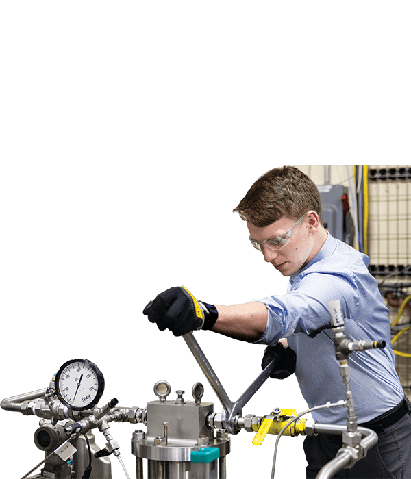An employee working on a piece of a product